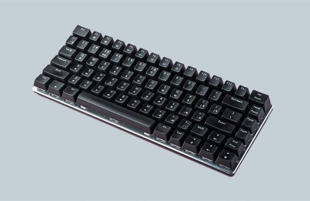 A keyboard with a grey background.